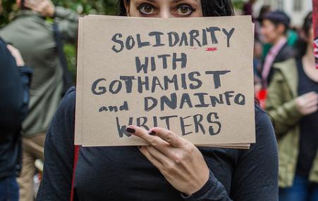 Demonstrators protest firing of DNAinfo and Gothamist writers.