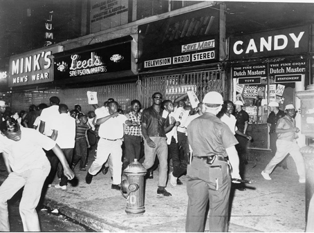Demonstrators carry posters with a picture of Lieutenant Thomas Gilligan. Throughout the riot, some chanted, “Killer Cops!” James Farmer, co-founder of the Congress of Racial Equality, called July 18 “New York’s night of Birmingham horror,” referencing the Alabama city’s use, in May 1963, of night sticks, water cannons, and police dogs against nonviolent Civil Rights marchers.