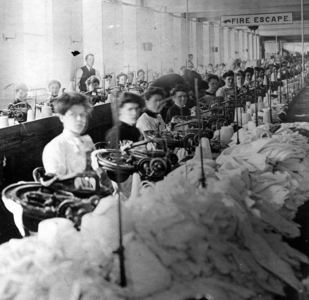 old black and white photo of women garment workers working 