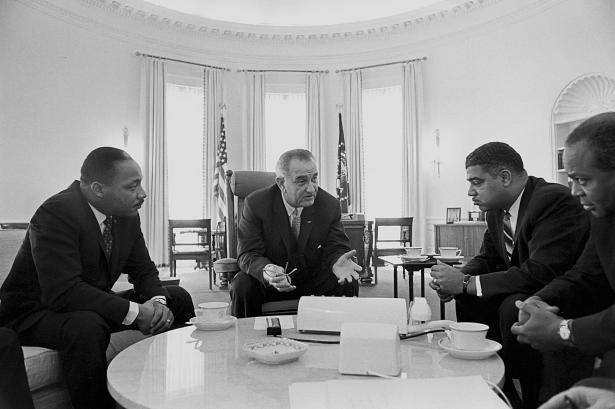 President Johnson in the White House talking with Martin Luther King, Jr., Whitney Young, Jr., and James Farmer