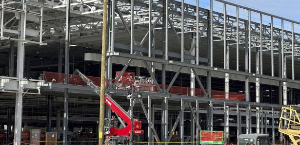 Photo of a factory being constructed. 