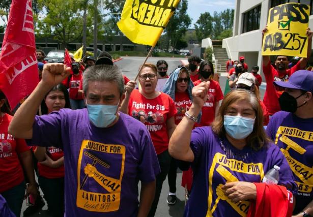 Crown protested with raised fists and signs