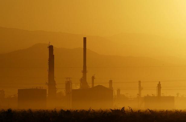 Sunrise at the Kern Oil and Refining Co. near the town of Lamont, California. 