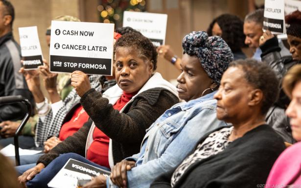 African-American women at a meeting protesting pollution