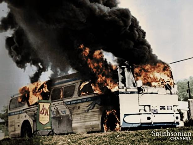 Freedom Riders bus aflame after having been firebombed near Anniston, Alabama