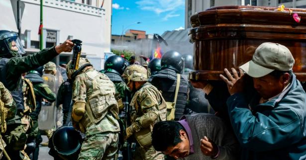 police attacking funeral in Bolivia