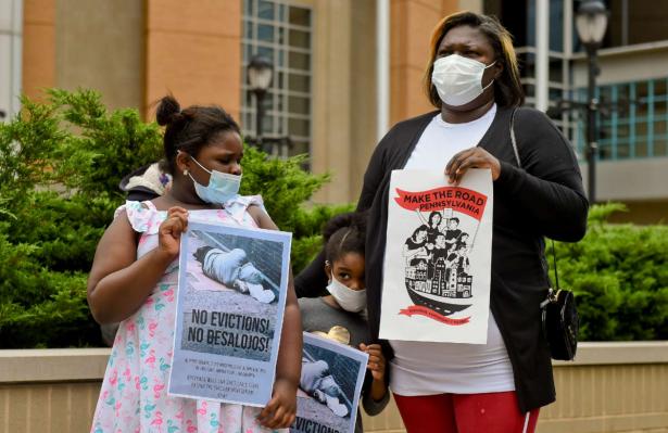 woman and daughters protesting