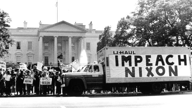 Demonstrators outside the White House calling for Nixon's impeachment