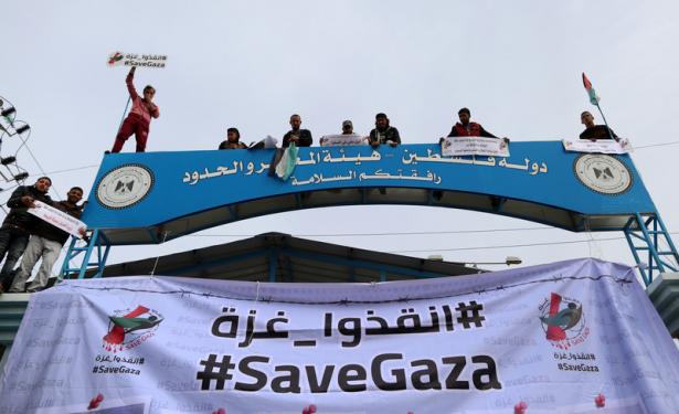 Palestinians protest siege on Gaza.