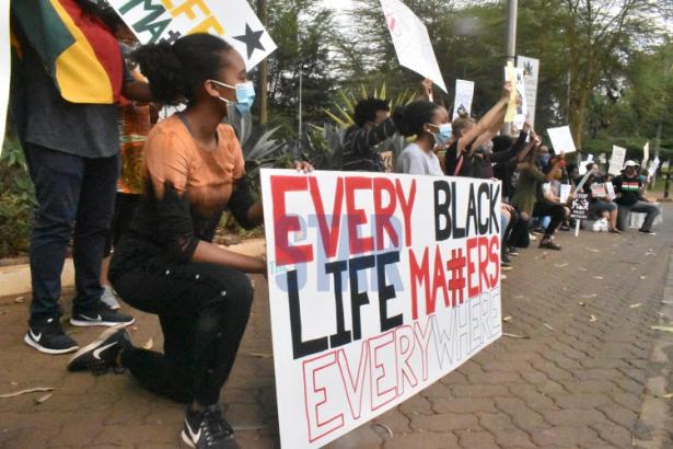 demonstrators in Kenya protesting US police killings of Blacks
