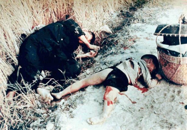VN man and boy murdered in My Lai by U.S. soldiers.