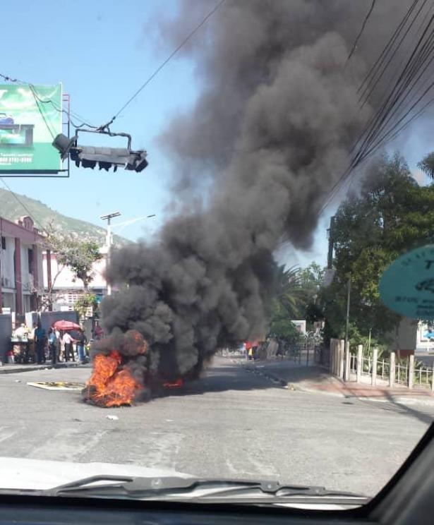 burning barricade in Haiti