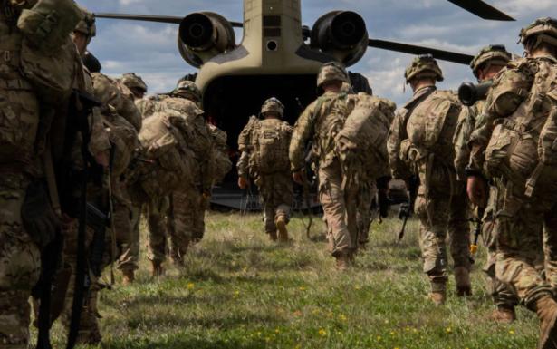 soldiers boarding military plane