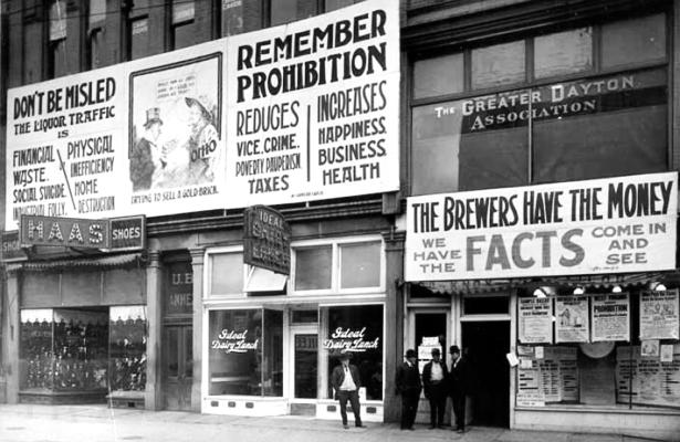 Storefronts covered with signs promoting prohibition