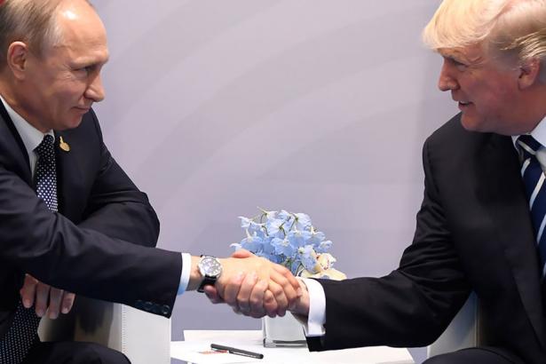 Vladimir Putin and Donald Trump shaking hands