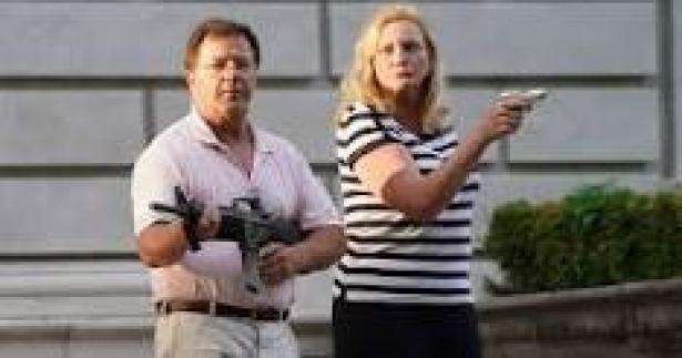 white couple with guns