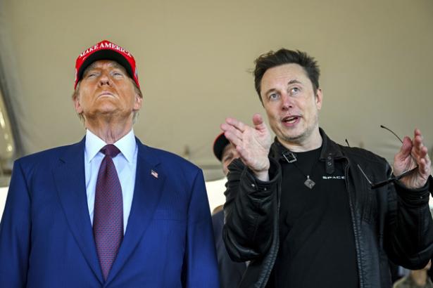 Photo of Trump and Musk from waist up.