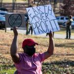 A protester seeks to block the Byhalia Connection Oil Pipeline in southwest Memphis, TN.