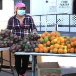 An Alameda County Community Food Bank worker in Oakland, California. 