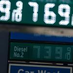 A sign displays diesel prices at a gas station in Los Angeles on Aug. 21. 
