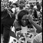 Haitians march in Miami to protest discriminatory treatment.