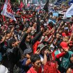Protesters stage a demonstration to mark International Labour Day in Manila, the Philippines, on May 1, 2026