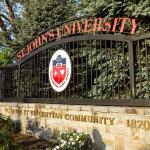 Photo of the entrance gate of St John's University