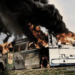 Freedom Riders bus aflame after having been firebombed near Anniston, Alabama