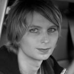 Chelsea Manning sitting in car