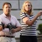 white couple with guns