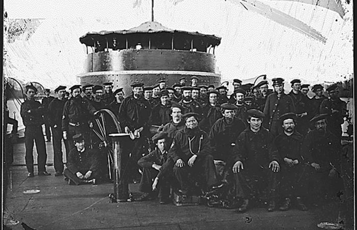 Sailors on the deck of the USS Monitor during the Civil War