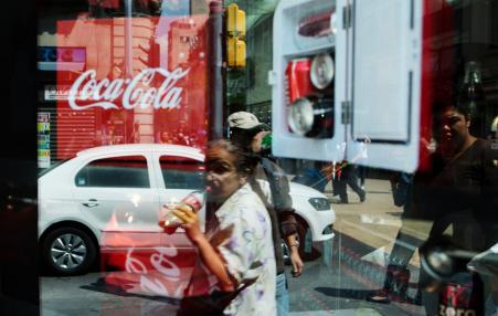 Coca-Cola products in a store window in Mexico City. ILSI shut down its Mexico branch after news media revealed that speakers at an ILSI conference on sweeteners were all advocates for the beverage industry.