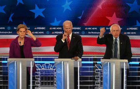 Three candidates at podiums at DNC primary debate 