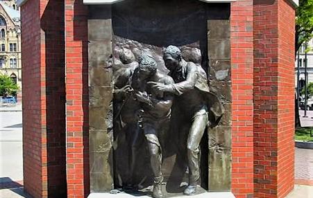 Photo of statue commemorating 1851 act of resistance to the Fugitive Slave Law in Syracuse, NY