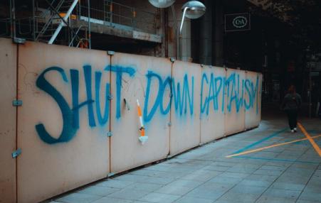 Gravity on a wall:  Shut Down Capitalism