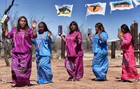      Indigenous people from the Tohono O’odham ethnic group dance and sing