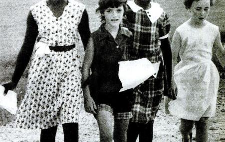 An integrated group of students, together immediately after their school was desegregated