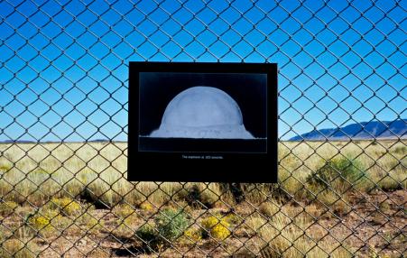 nuclear explosion sign on fence
