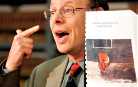 Photo of attorney Michael Ratner denouncing torture of prisoners at Guantanamo