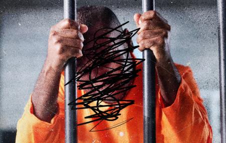 Photo of a man behind bars with his face crossed out with magic marker. 