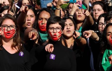 women demonstrating against rape